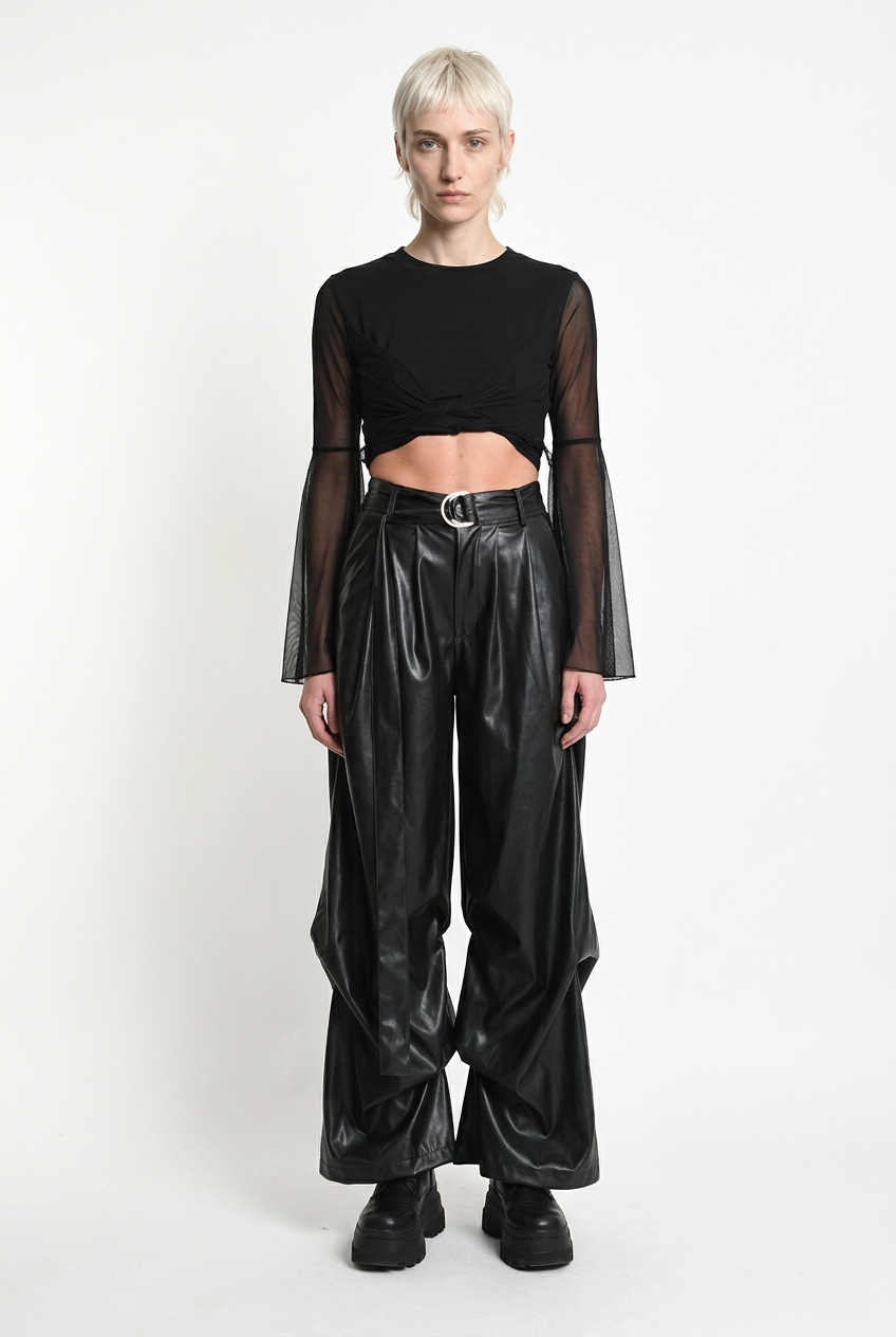 LA HAINE INSIDE US W5468 faux leather trousers in black — front editorial view