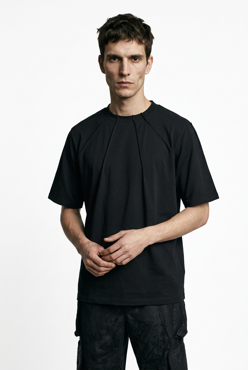 LA HAINE INSIDE US M1375 black oversized cotton stretch T-shirt, front view with hands clasped
