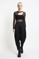 LA HAINE INSIDE US W5469 satin balloon trousers in black — walking editorial view