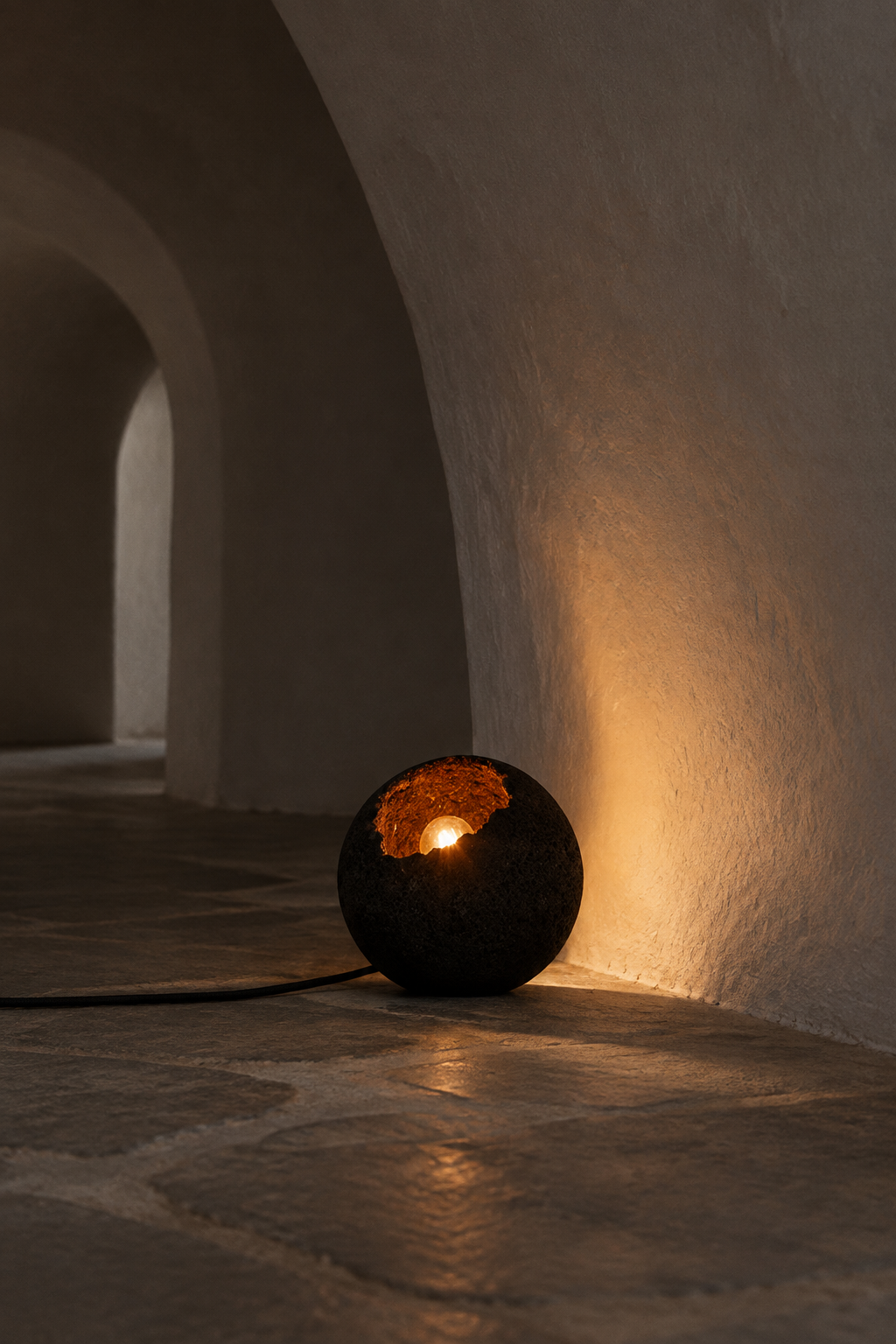 Lit in a vaulted interior