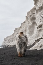 Vlychada pumice cliffs and black sand