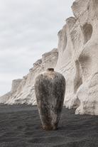 Vlychada pumice cliffs and black sand