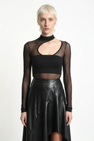LA HAINE INSIDE US W5418 asymmetric faux leather skirt in black — waistband and upper flounce editorial detail