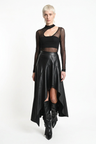 LA HAINE INSIDE US W5418 asymmetric faux leather skirt in black — walking front editorial view