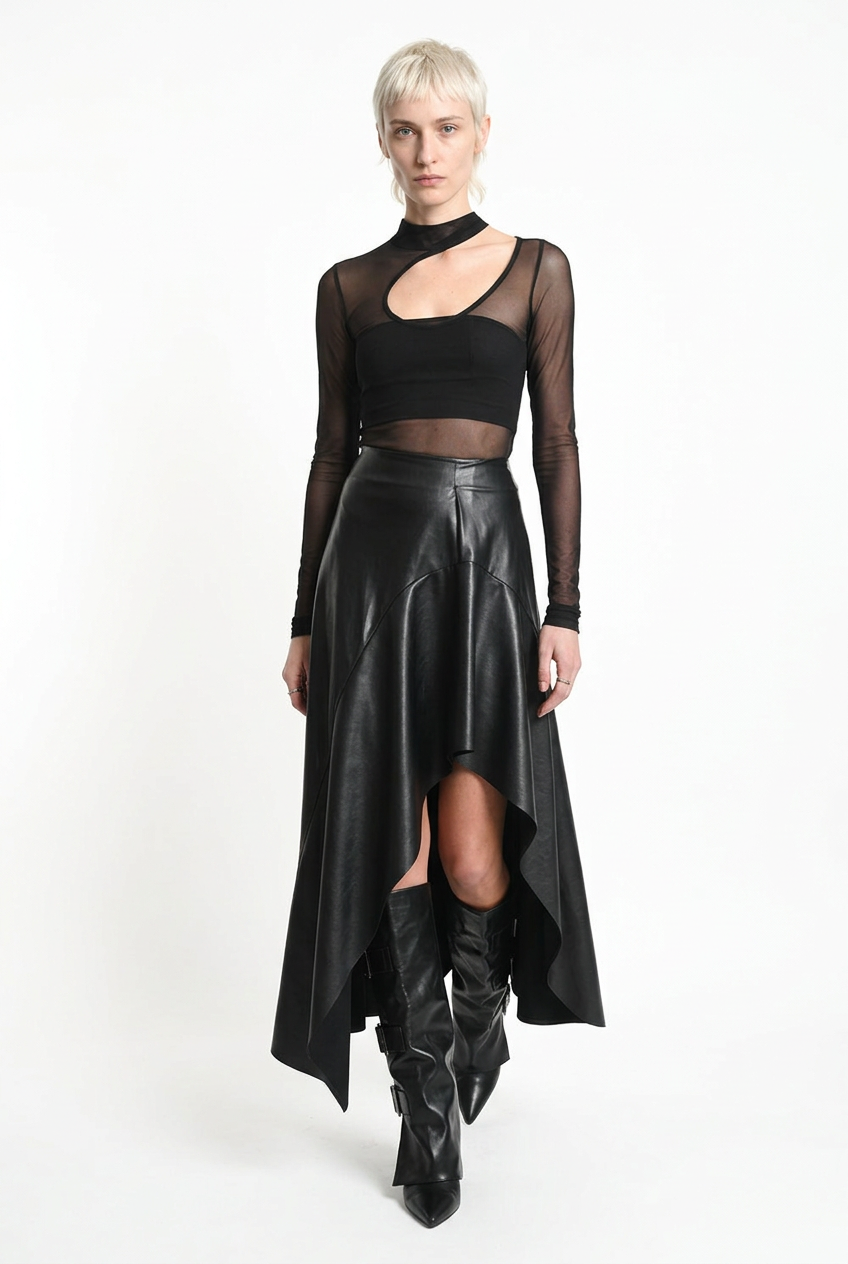 LA HAINE INSIDE US W5418 asymmetric faux leather skirt in black — walking front editorial view