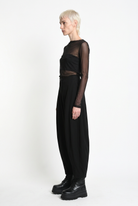 LA HAINE INSIDE US W5444 balloon trousers in black — side editorial view