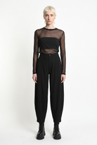 LA HAINE INSIDE US W5444 balloon trousers in black — front editorial view