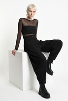 LA HAINE INSIDE US W5444 balloon trousers in black — seated editorial view