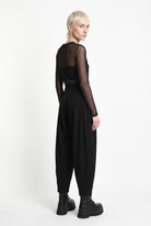 LA HAINE INSIDE US W5444 balloon trousers in black — rear three-quarter editorial view