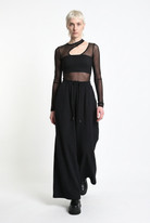 LA HAINE INSIDE US W5451 black embossed fleece palazzo trousers, walking front view