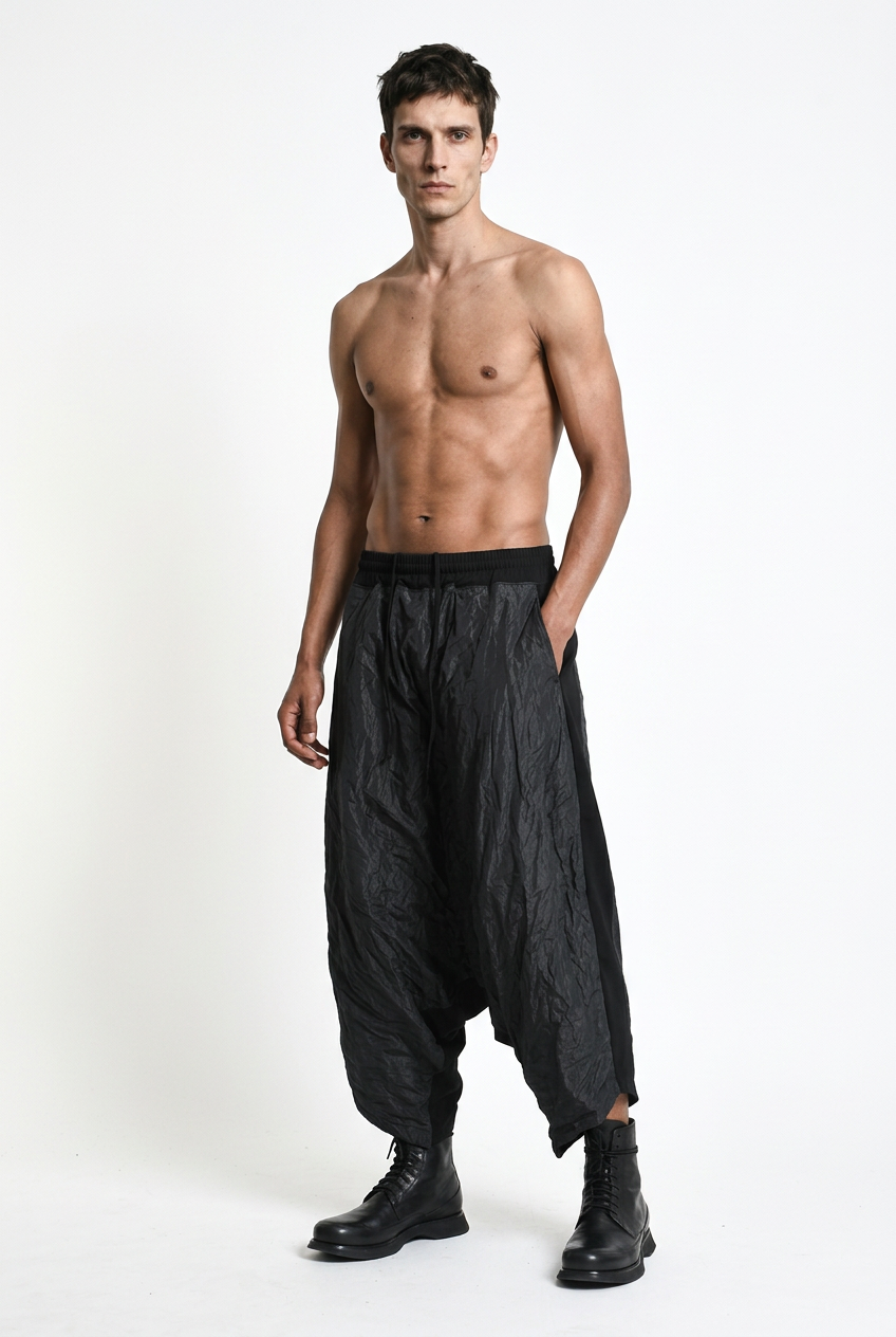 LA HAINE INSIDE US W5488 black baggy drop-crotch trousers, male model, three-quarter front view