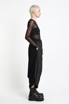LA HAINE INSIDE US W5488 black baggy drop-crotch trousers, female model, full-length side view