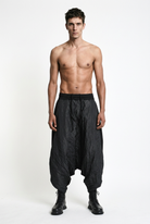 LA HAINE INSIDE US W5488 black baggy drop-crotch trousers, male model, full-length front view